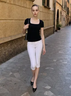 Caucasian skin tone, female-presenting, age 20–30, oval face shape, symmetrical facial features, straight medium-length brown hair, slim athletic body type, natural makeup look.