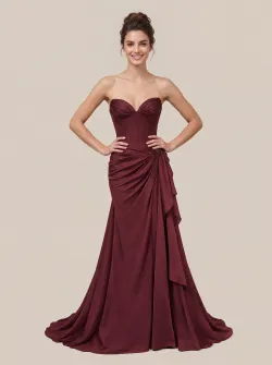 Exquisite updo hairstyle, model with hands on hips and smiling